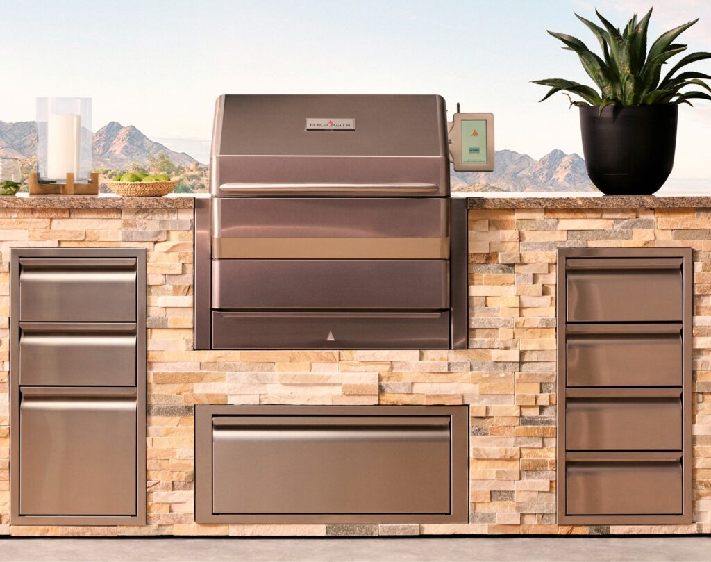 A Memphis pellet grill built into an outdoor island