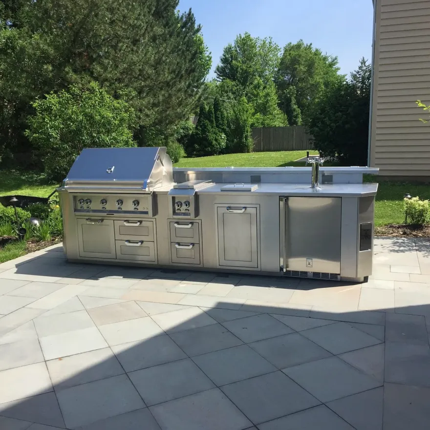 Stainless steel outdoor kitchen island with built-in grill and double side burner