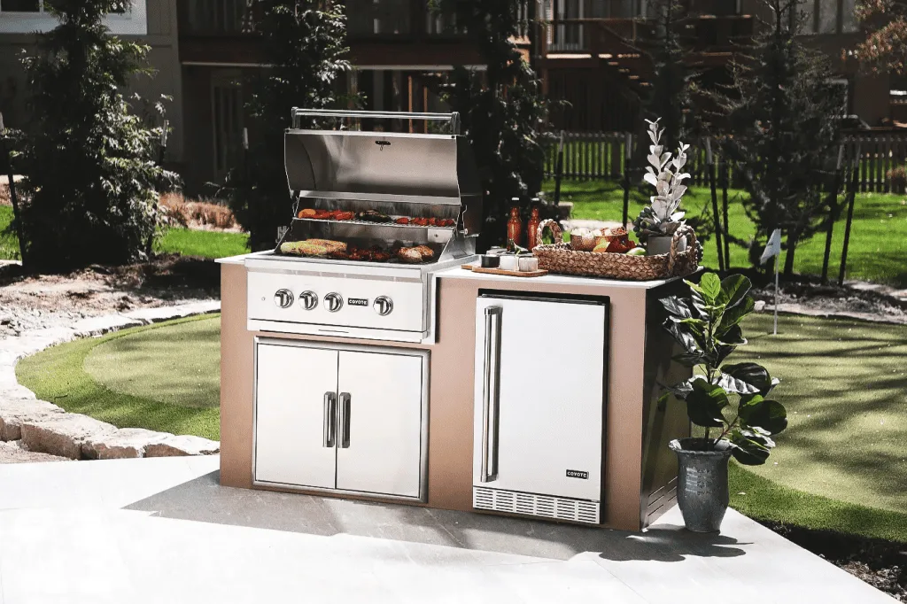 A premium built-in grill integrated into an outdoor kitchen island