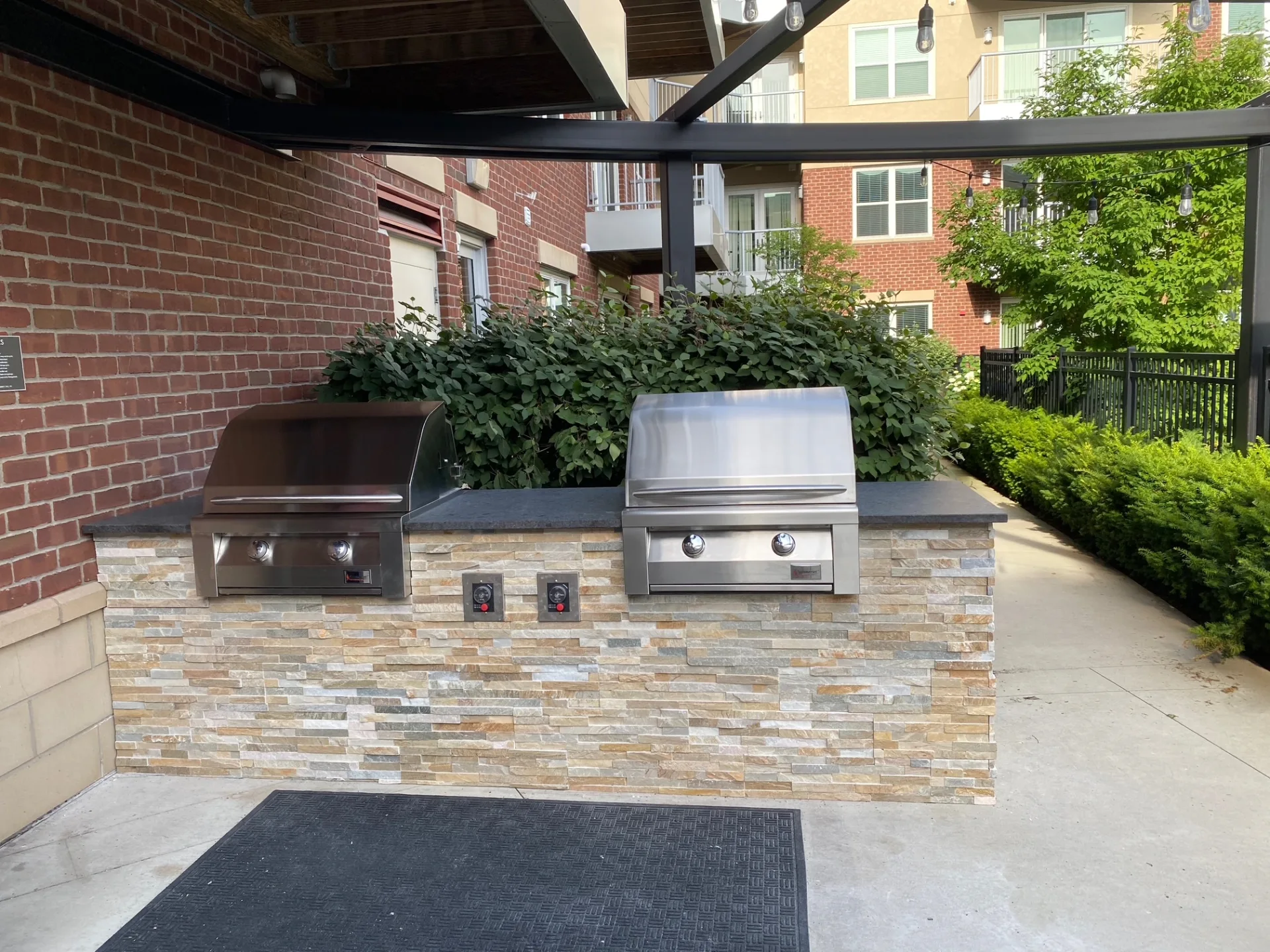 Completed stone outdoor kitchen project — total investment $16,650