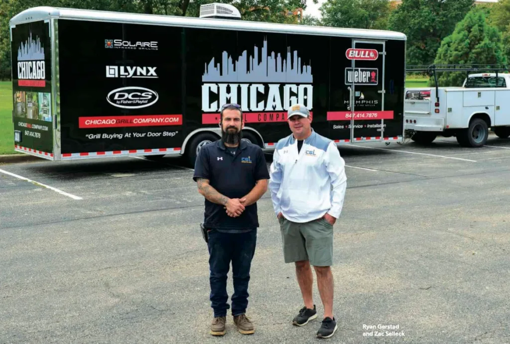 Chicago Grill Company owners Ryan Gerstad and Zac Selleck in front of the 28-foot mobile showroom trailer